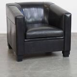 Very comfortable black Art Deco design armchair, made of sheepskin leather