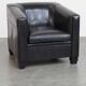 Very comfortable black Art Deco design armchair, made of sheepskin leather