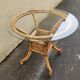 beautiful 1970s bamboo and rattan dining table with a glass top