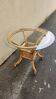beautiful 1970s bamboo and rattan dining table with a glass top