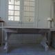 Console, solid walnut table, foldable extensions, grey patinated legs.