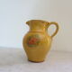 Enamelled terracotta pitcher