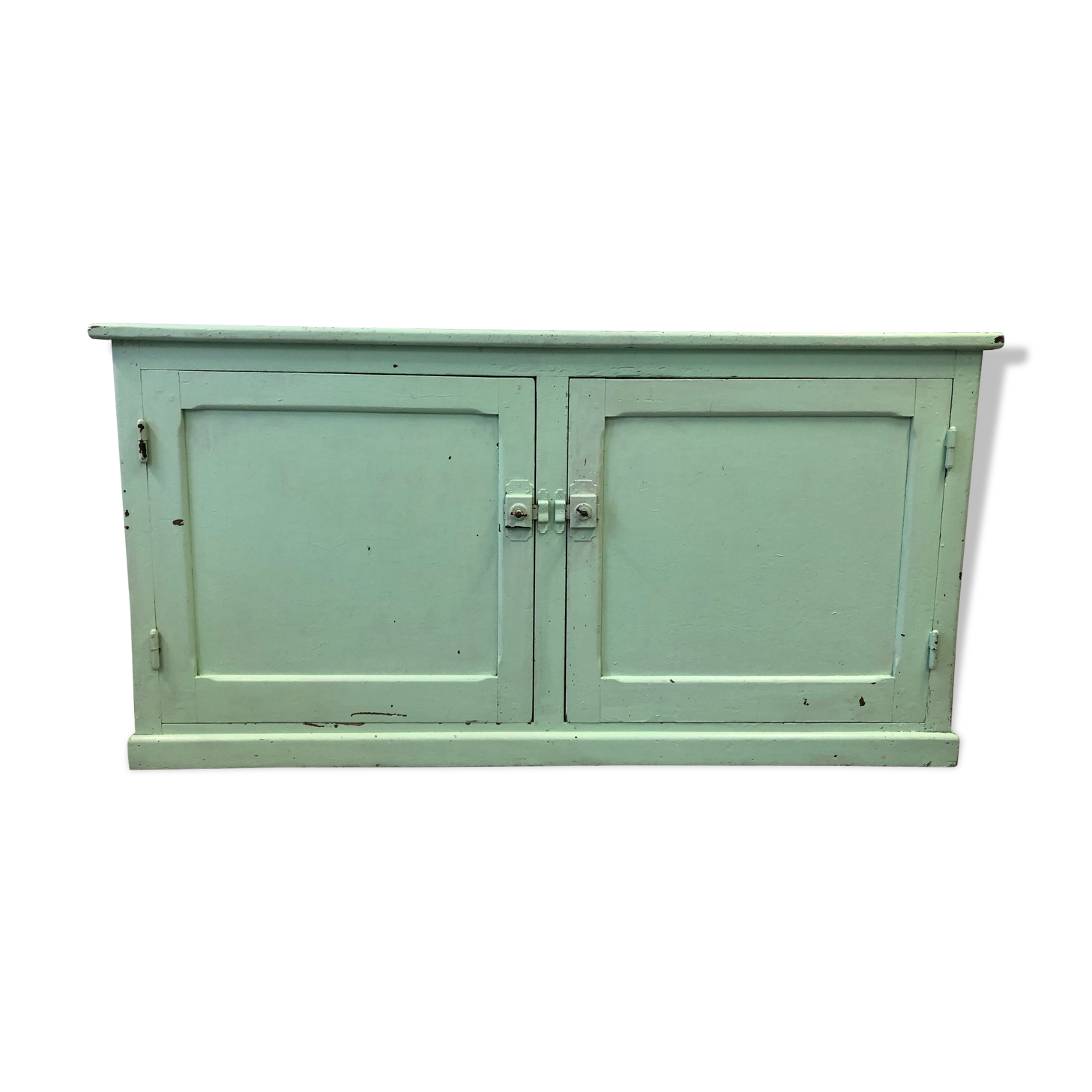 Low green patinated furniture