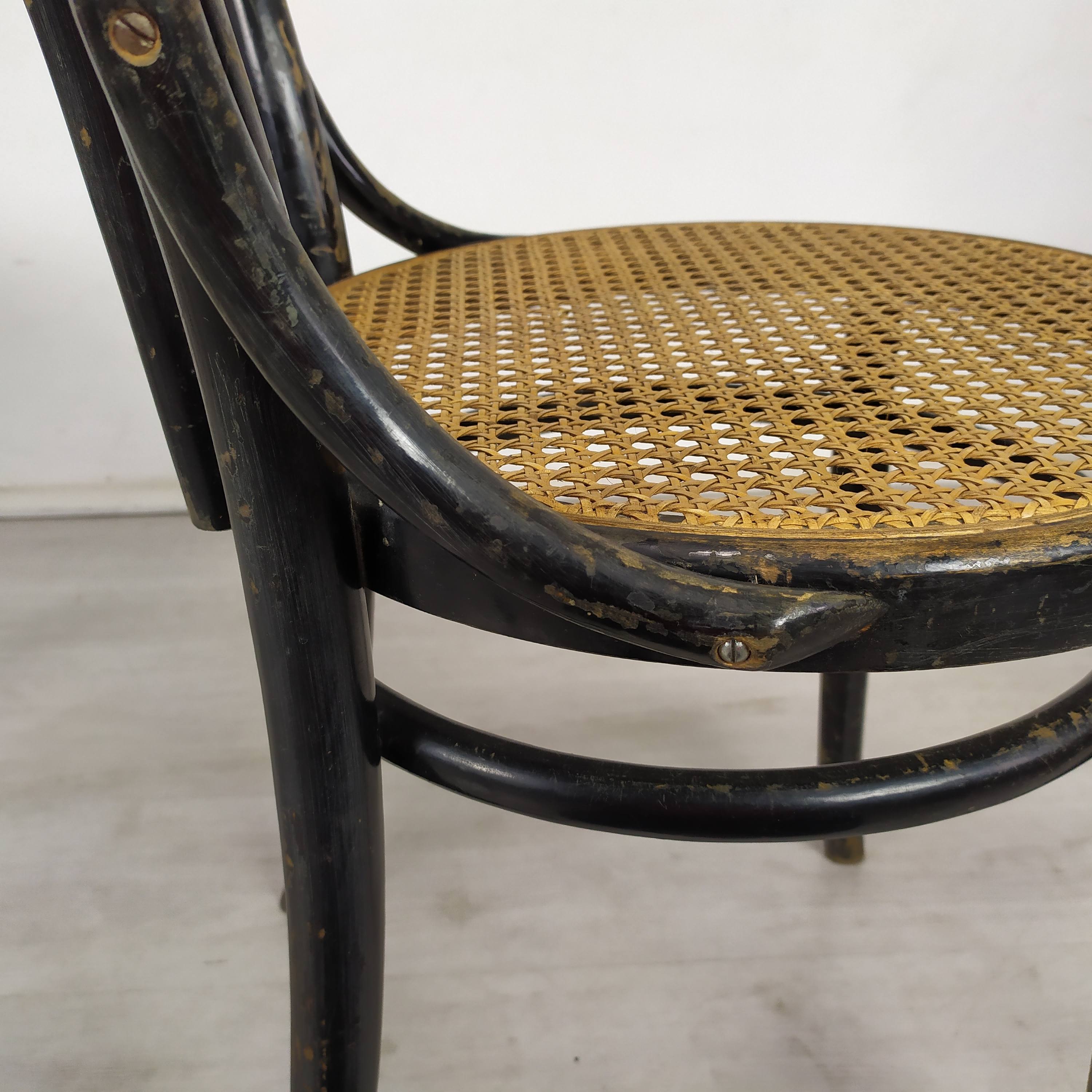 Black canned bistro chairs