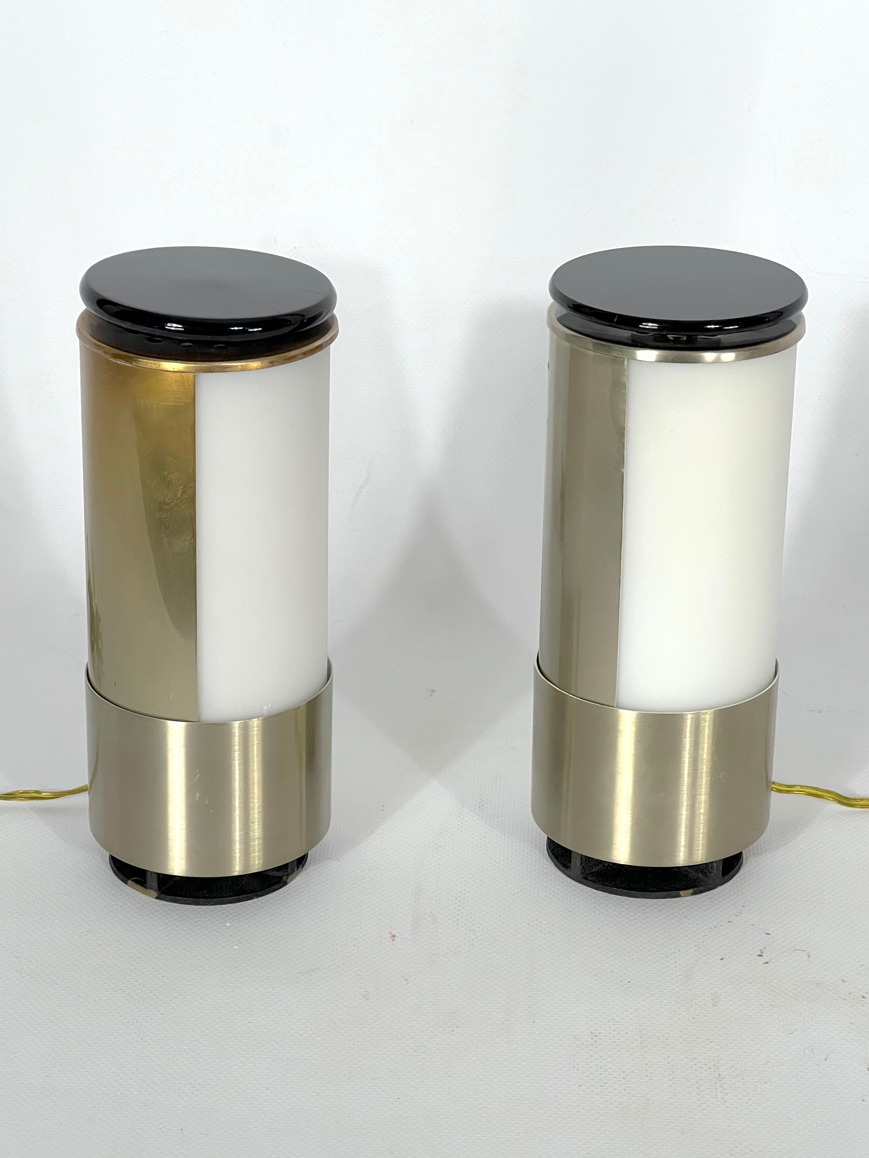 Mid-century modern pair of rare labeled Lumi Milano table lamps