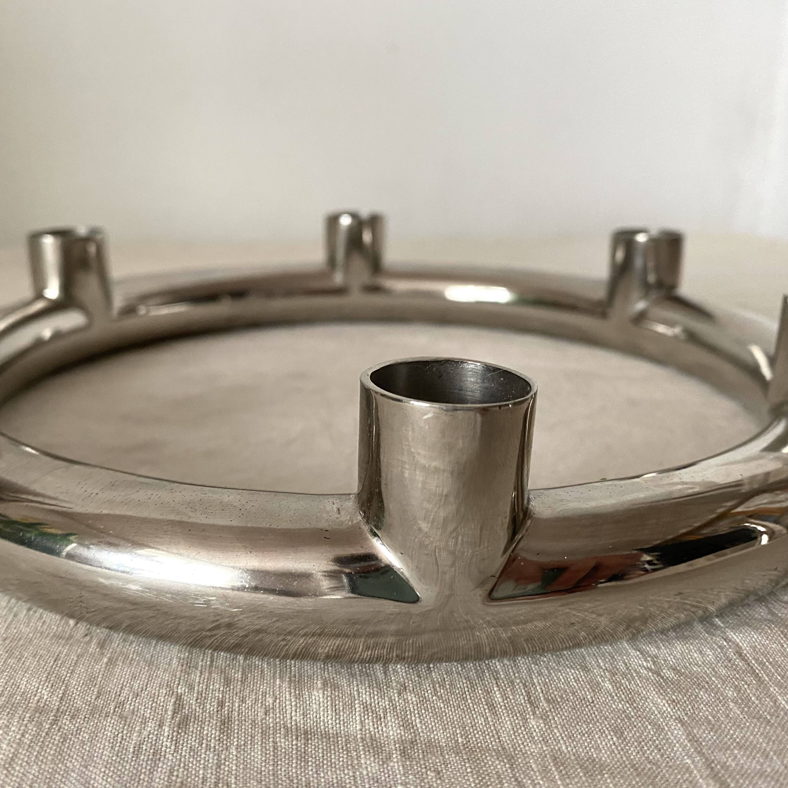 Tubular chrome candle holder