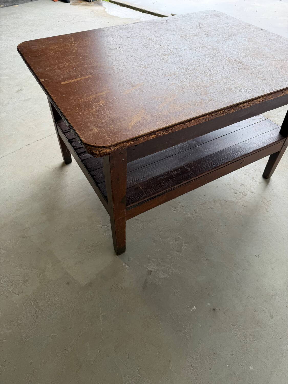 Antique draper's workbench / haberdashery table in solid wood from the early 20th century.