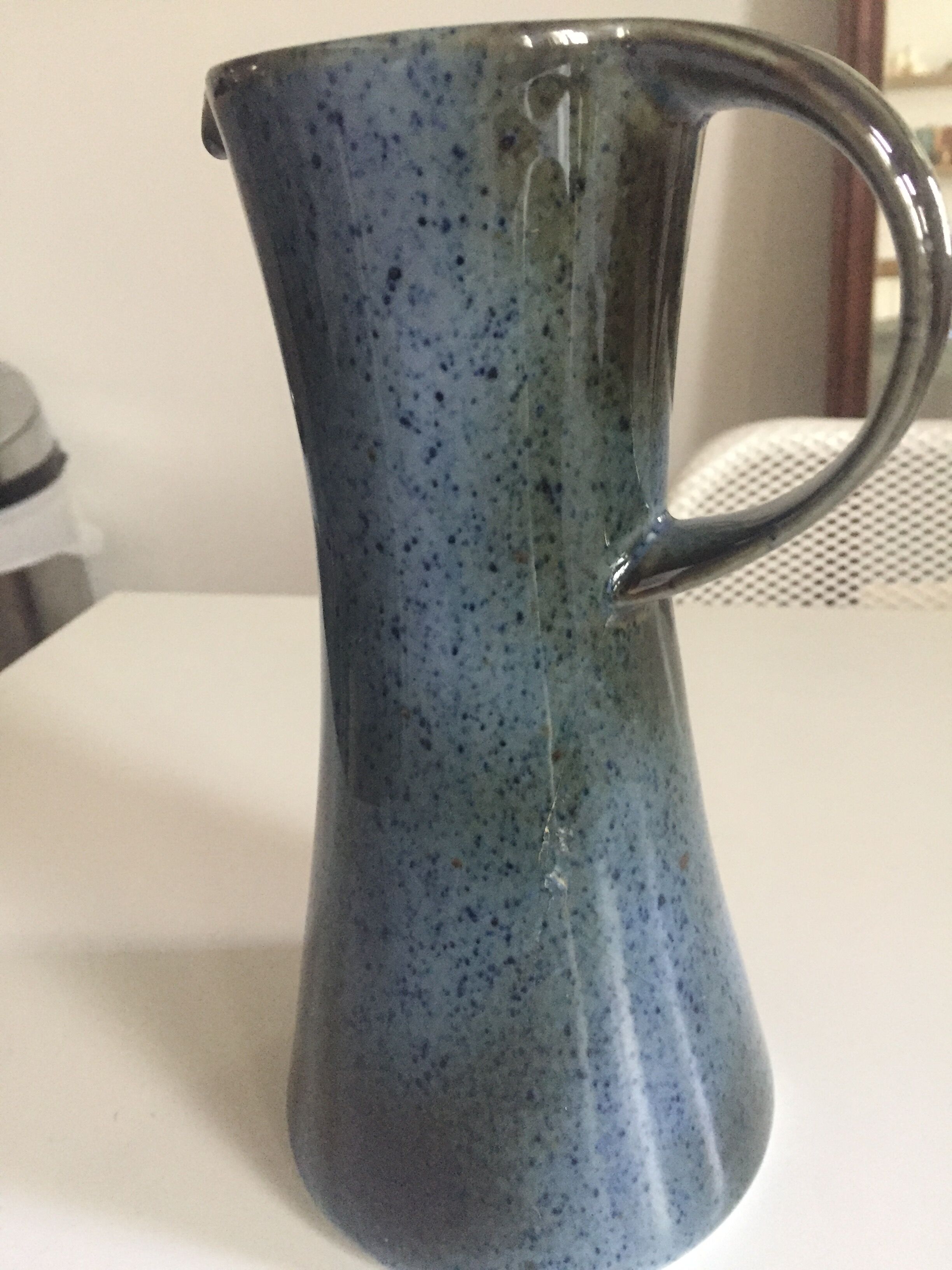 Very glazed blue pitcher