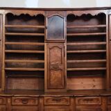 Clockside cabinet from the Louis XV period in walnut and elm, fully carved.