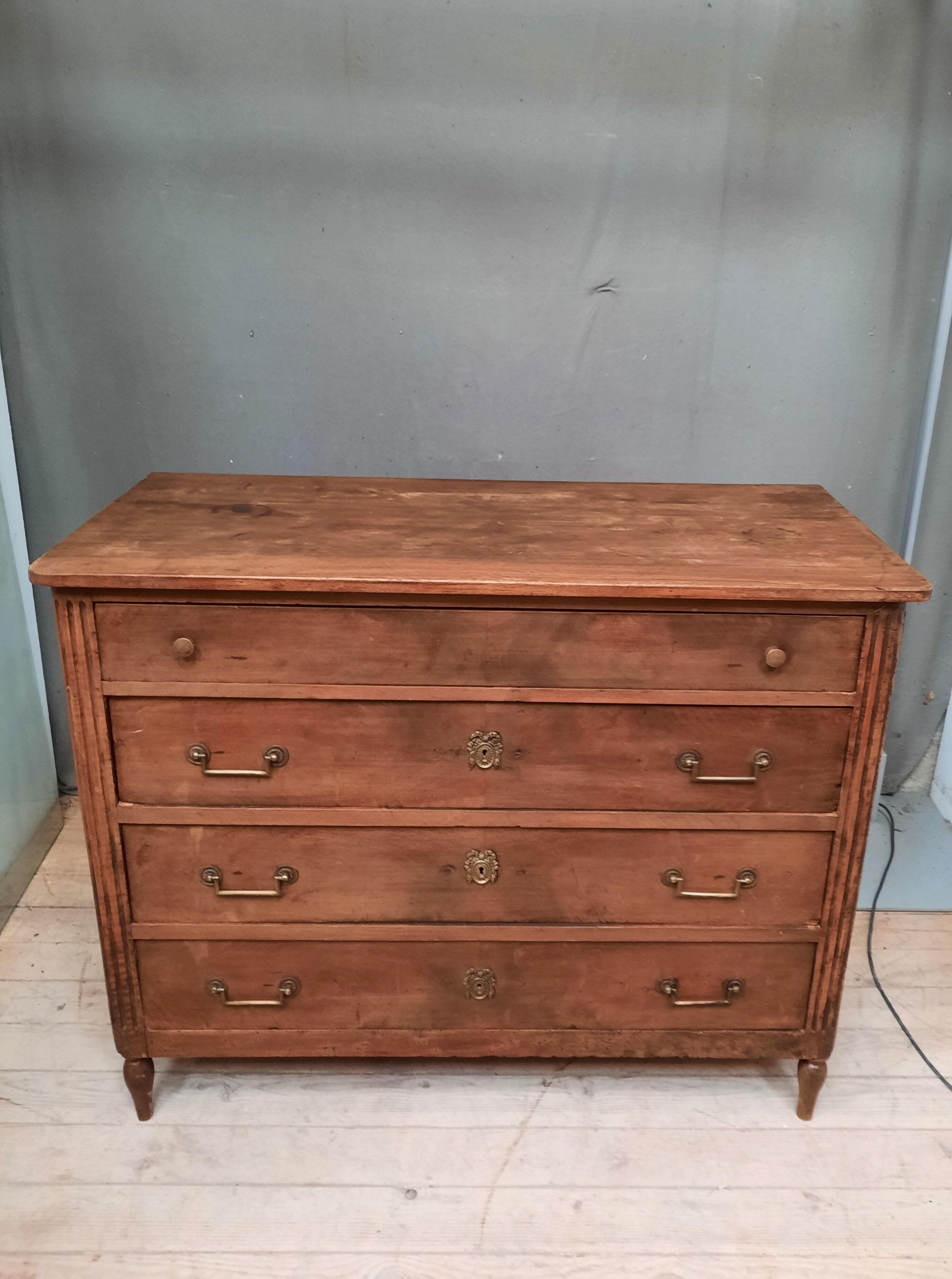 Louis XVI chest of drawers in natural wood