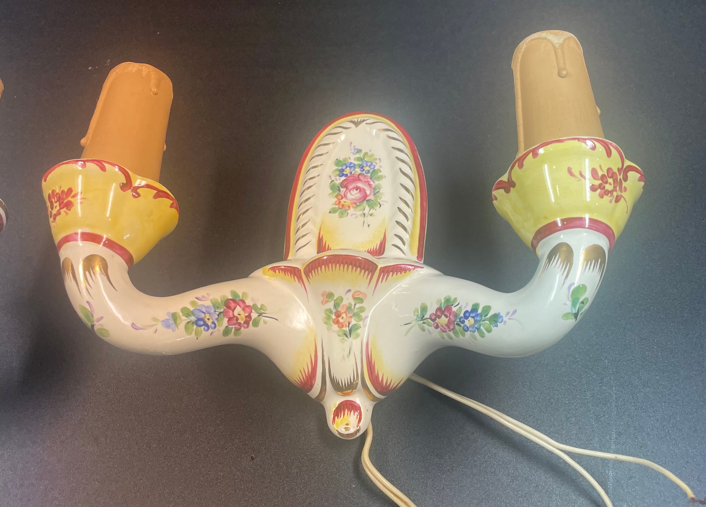 Pair of east sconces floral decor