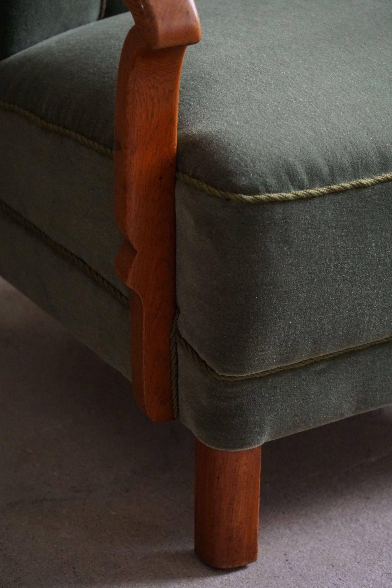 Danish Art Deco, set of 3 oak armchairs, reupholstered in green mohair, 1930s.