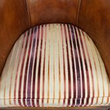 Set of 2 cognac-colored sheepskin club chairs with colorful fabric cushions