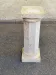 Natural stone pedestal column in beige marble, neoclassical style, 77cm.