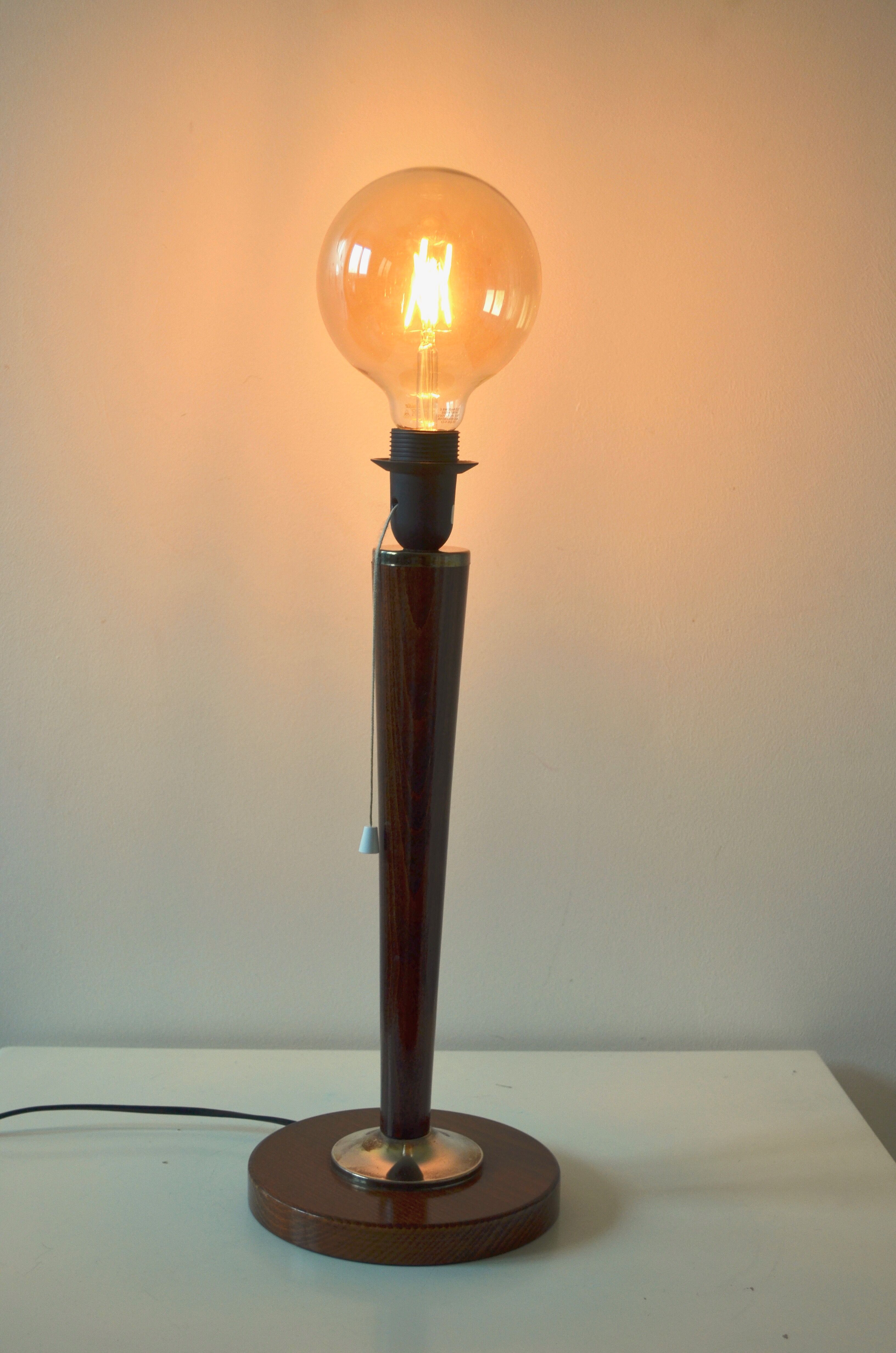 Pair of feet of Mazda-style UNILUX lamps.