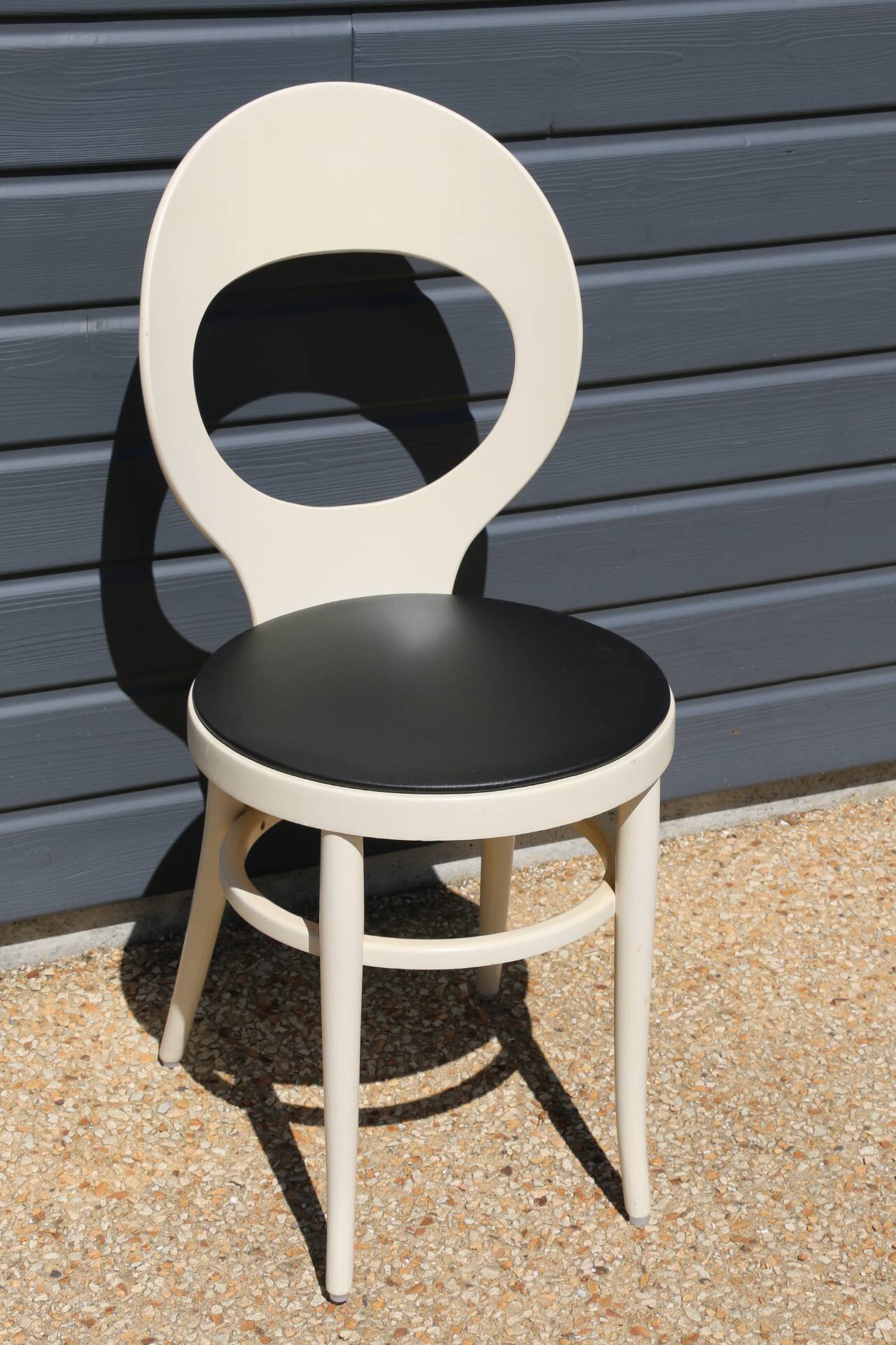 Baumann white seagull chair with black leatherette