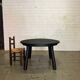 Brutalist round table in burnt wood yakisugi