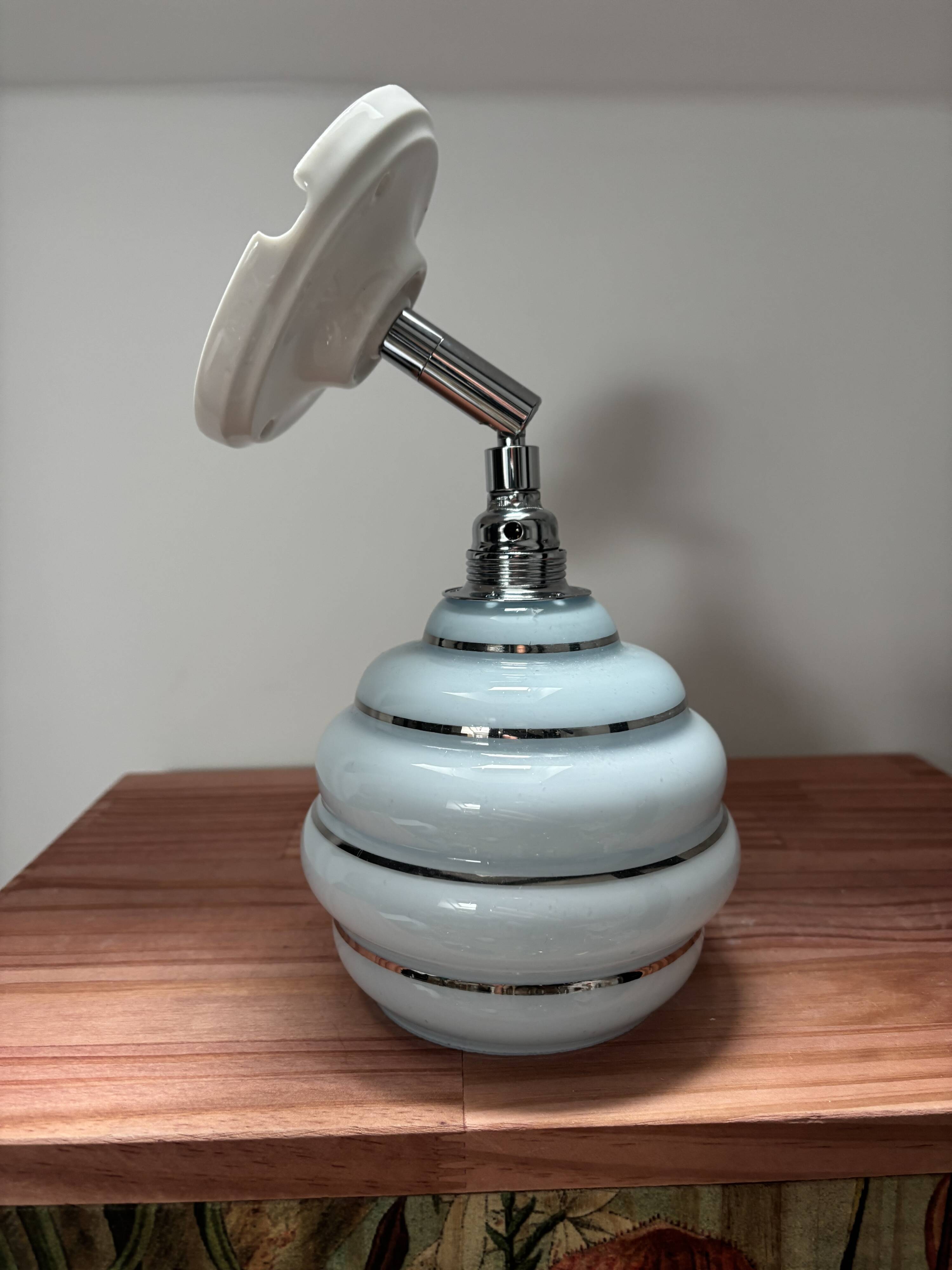 Blue and silver wall light