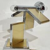 Lámpara de pared metálica. Italia, 1970s.