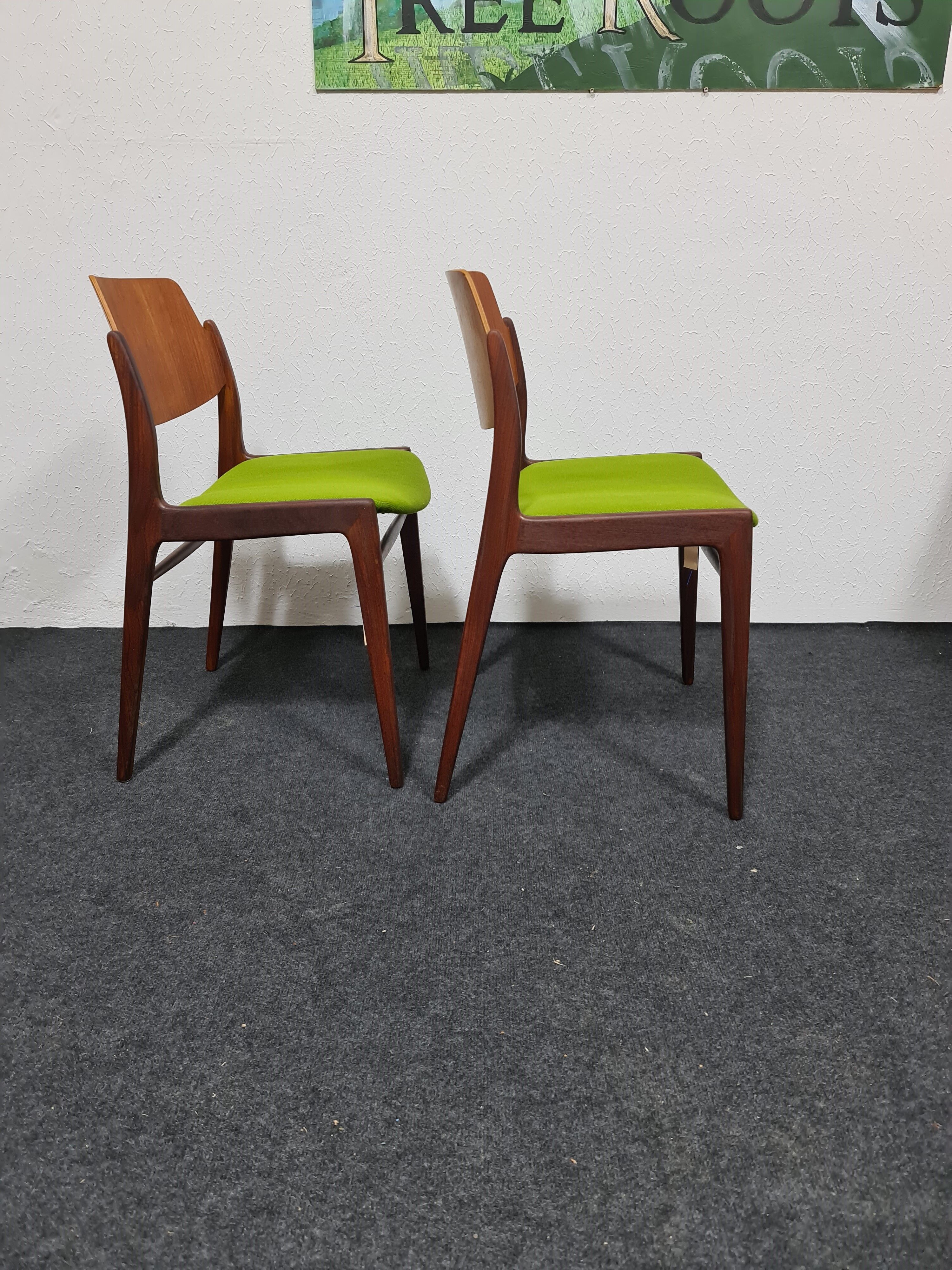 Two vintage teak dining chairs