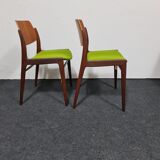 Two vintage teak dining chairs