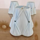 Set of 3 pale blue plastic strip lampshades, to clip onto a bulb.