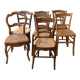 Set of 7 antique wooden and straw chairs.
