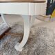 Restored oak table in natural wood and linen.