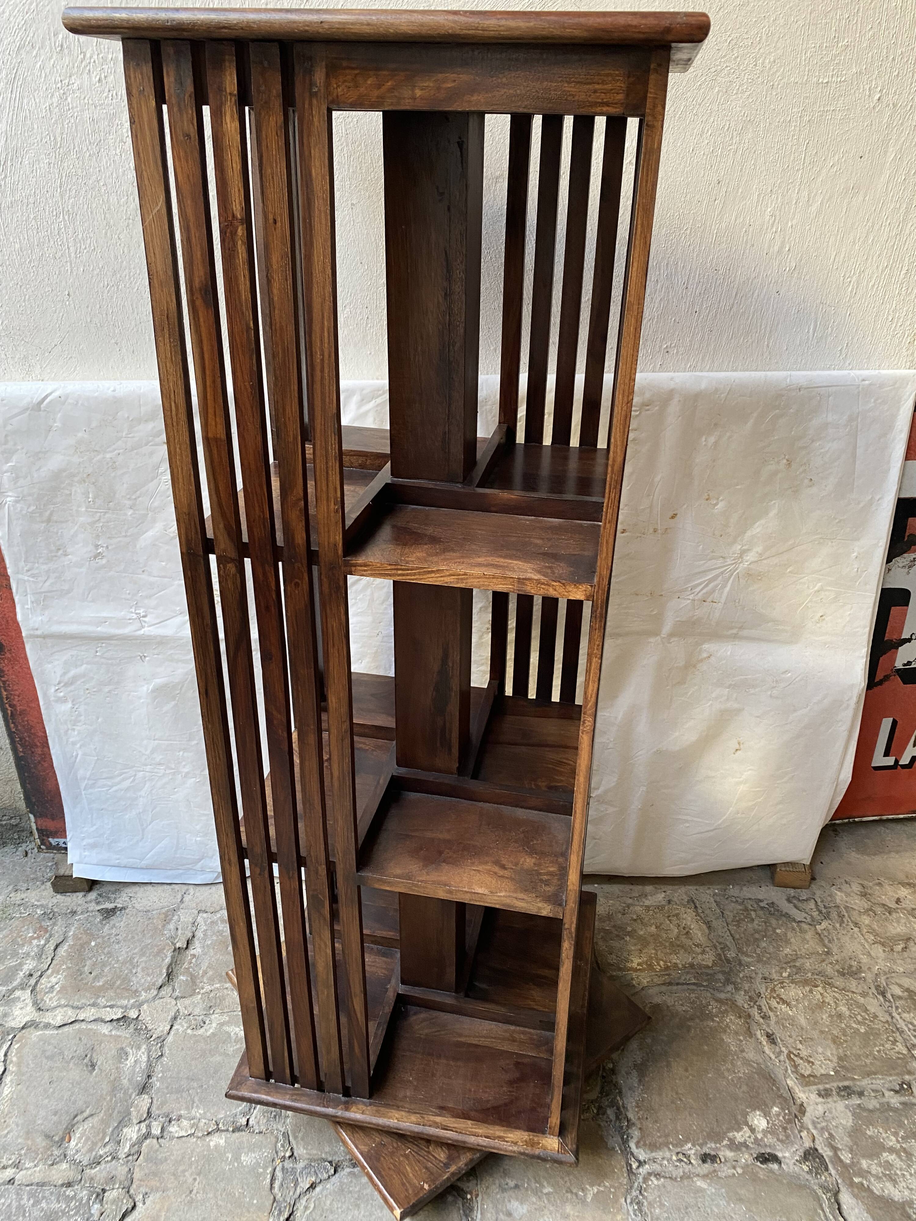 Pivoting column library in mahogany, 20th century.