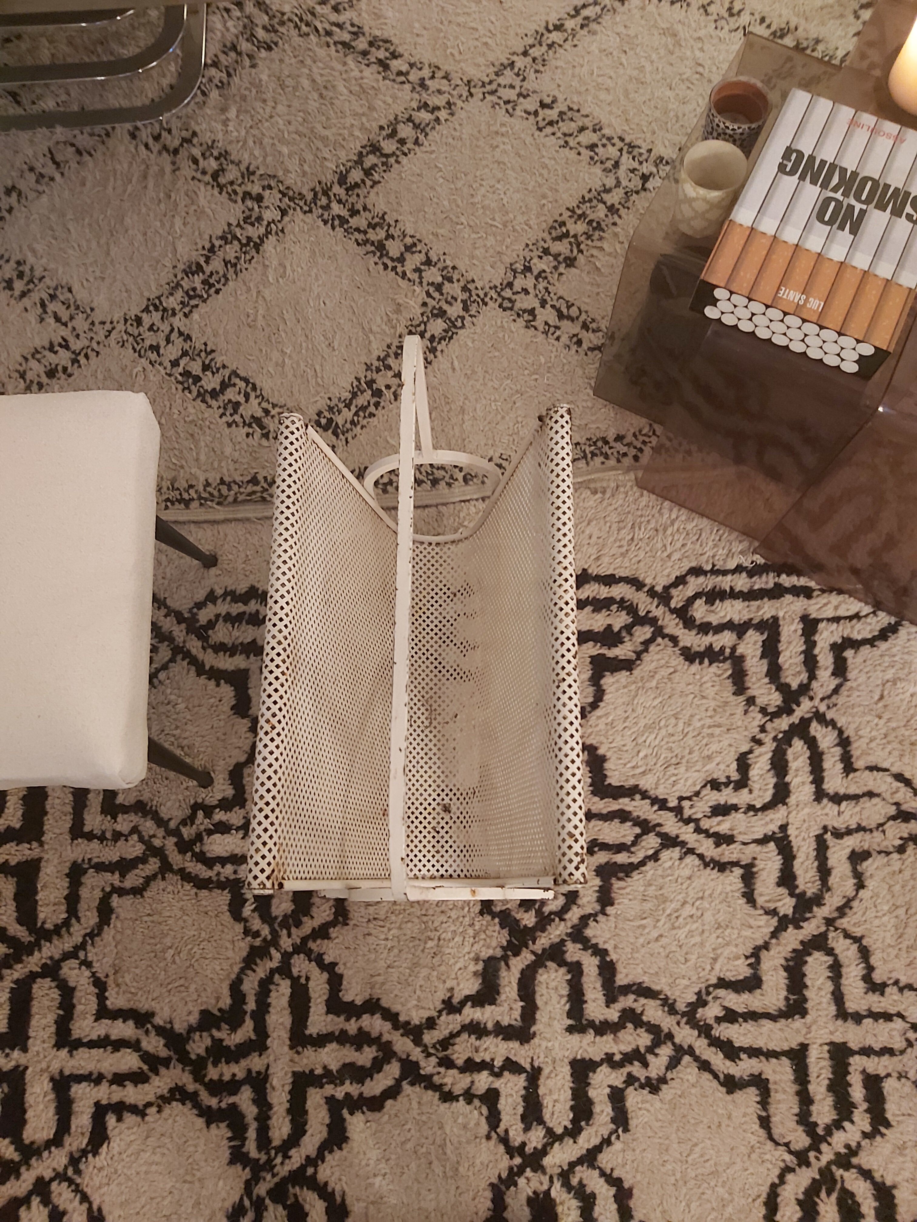 Vintage perforated metal magazine holder