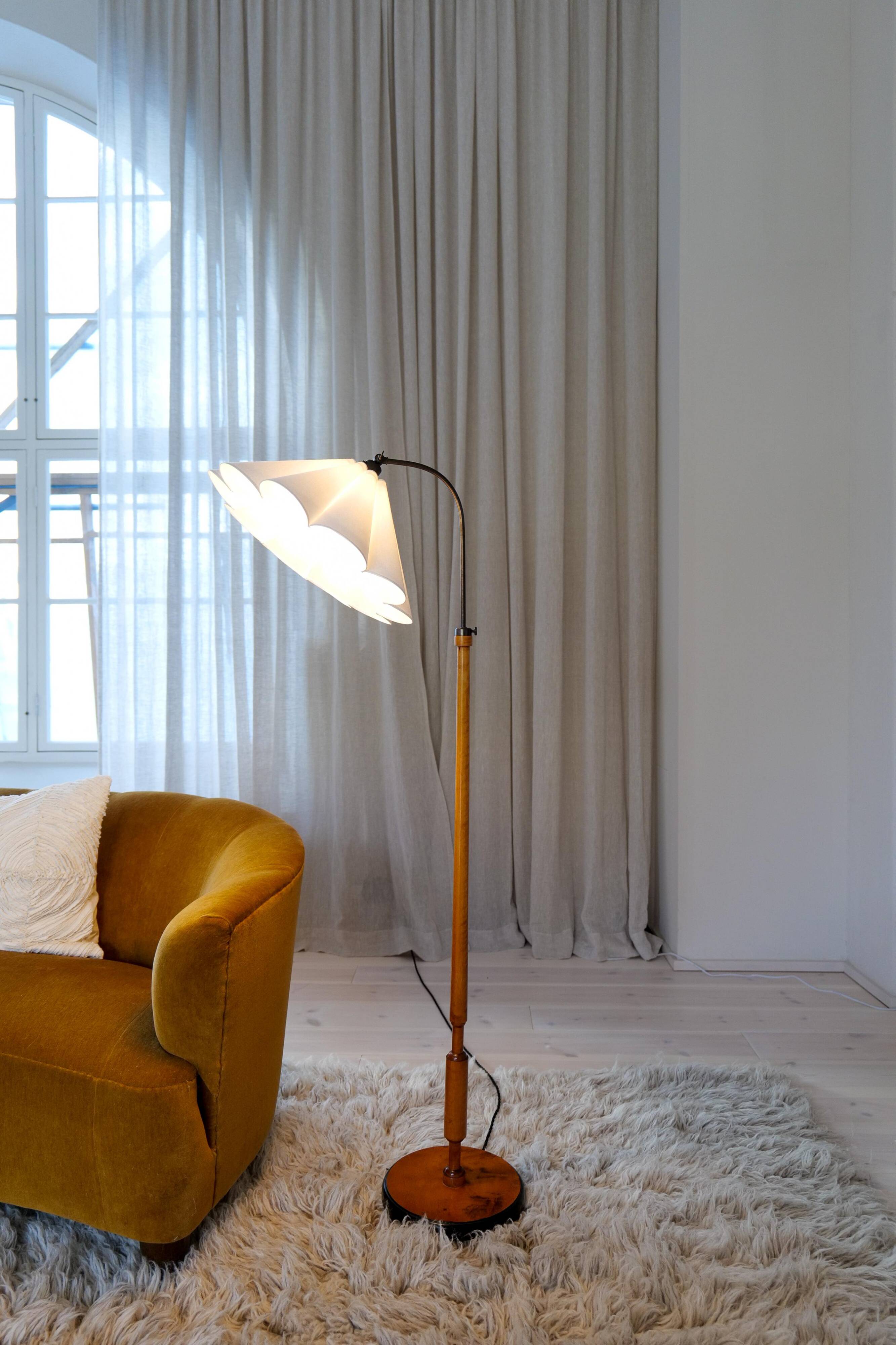 Organic Art Deco floor lamp in stained birch, Sweden, 1930s.