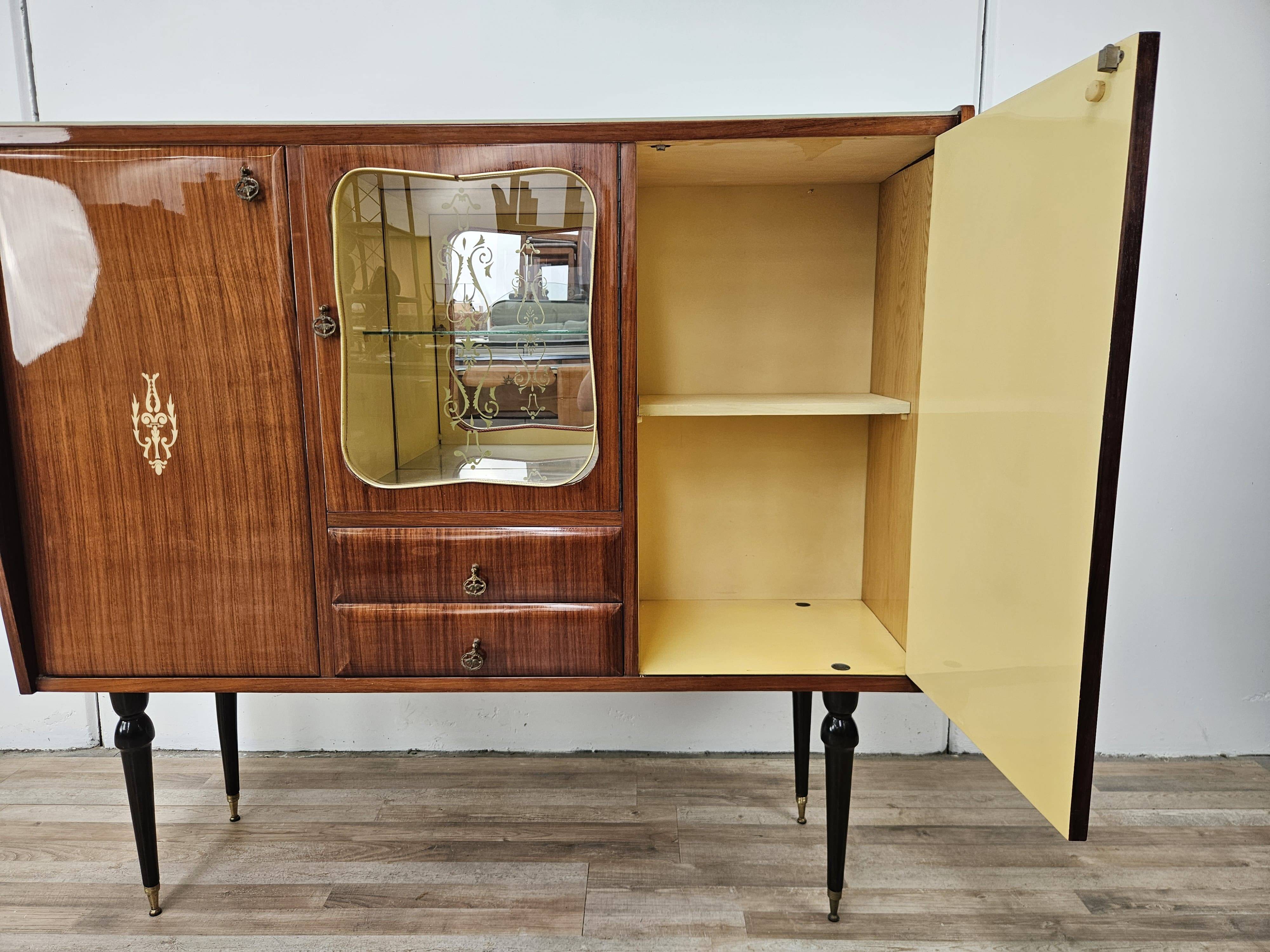 Mid-century 1960s mahogany showcase with glass top