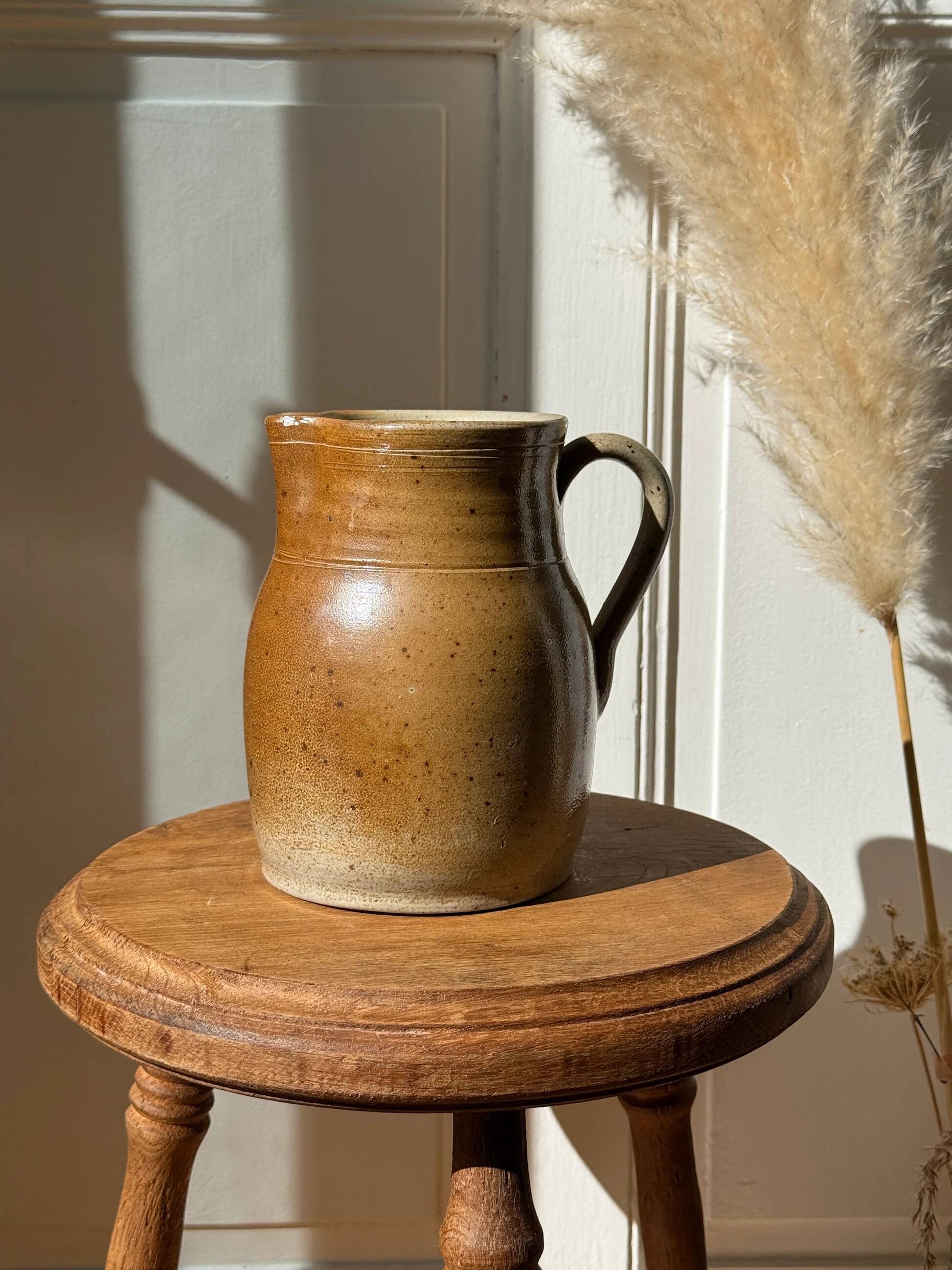 Vintage stool in raw wood
