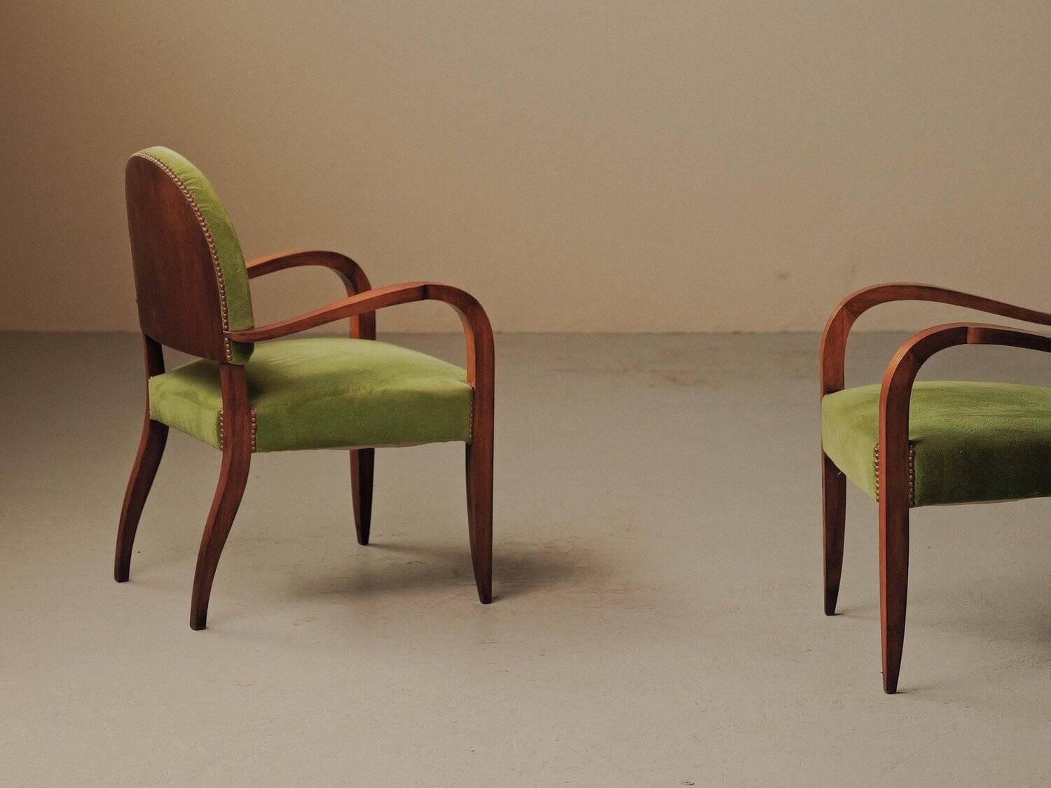 Pair of Art Deco armchairs in mahogany, circa 1930.