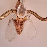 Gold wall light with tassel