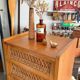 Vintage 1960s chest of drawers / chiffonnier with tapered legs and rattan.