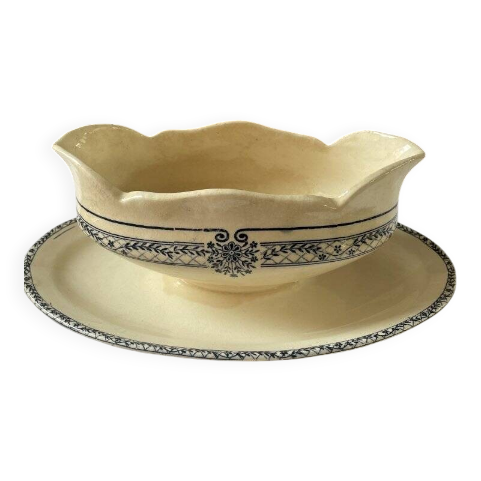 Sauceboat on a wrought iron base from Salins.