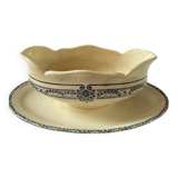 Sauceboat on a wrought iron base from Salins.