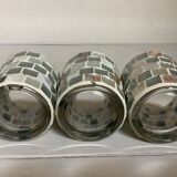 Four mosaic mirror and mother-of-pearl candle holders.