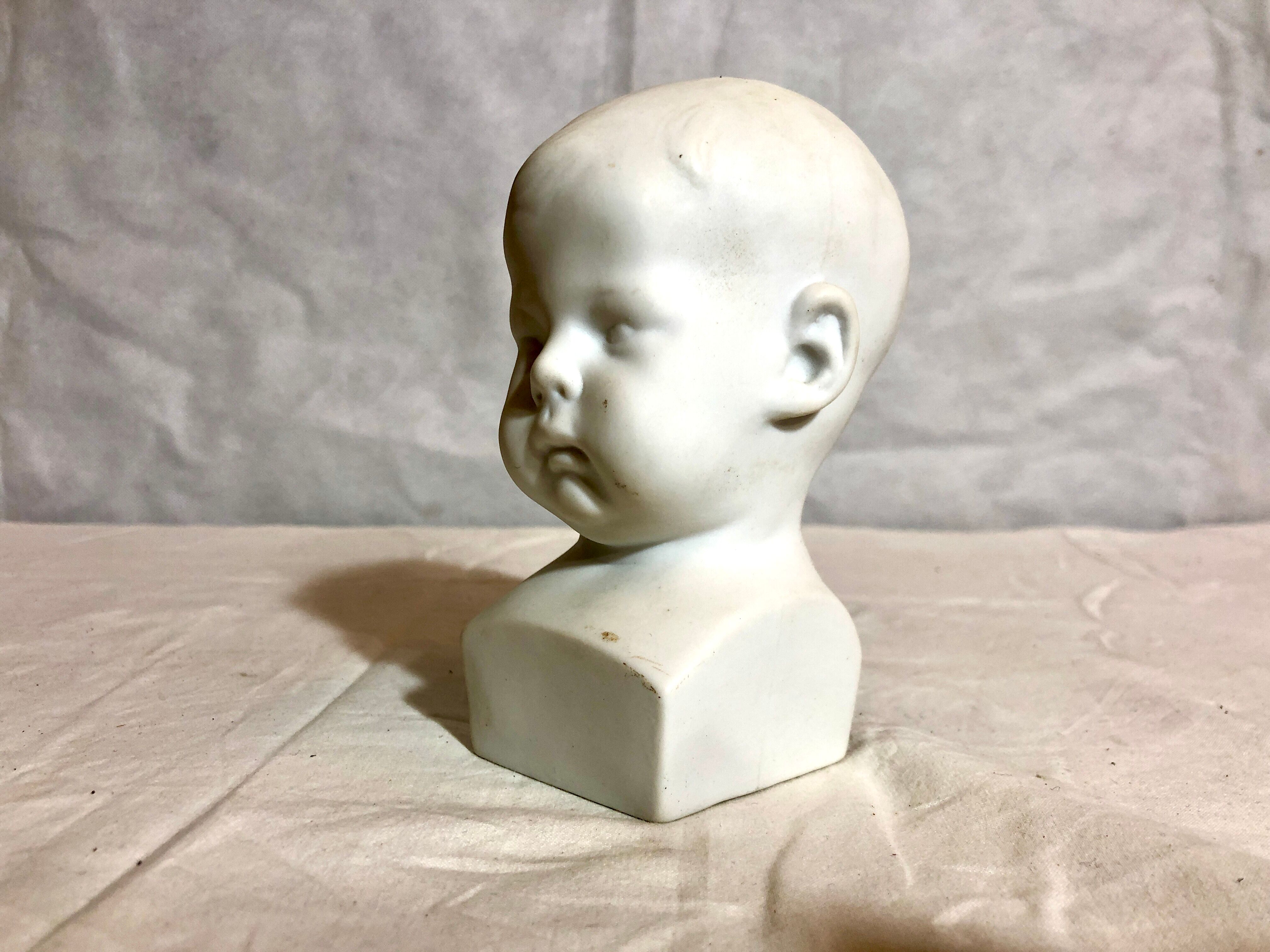Tête d’enfant en biscuit, XXe siècle