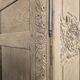 Armoire normande décapée richement sculptée
