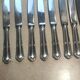 lot de 10 couteaux en metal argentè