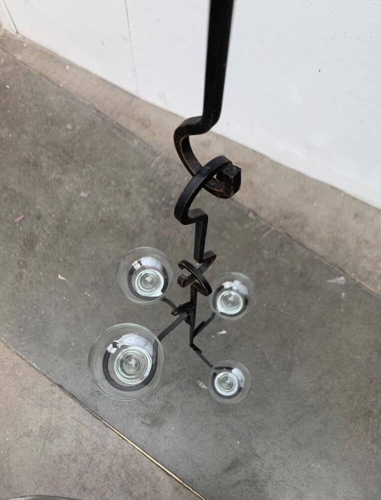 Mid-century metal and glass pendant light from the 1960s.