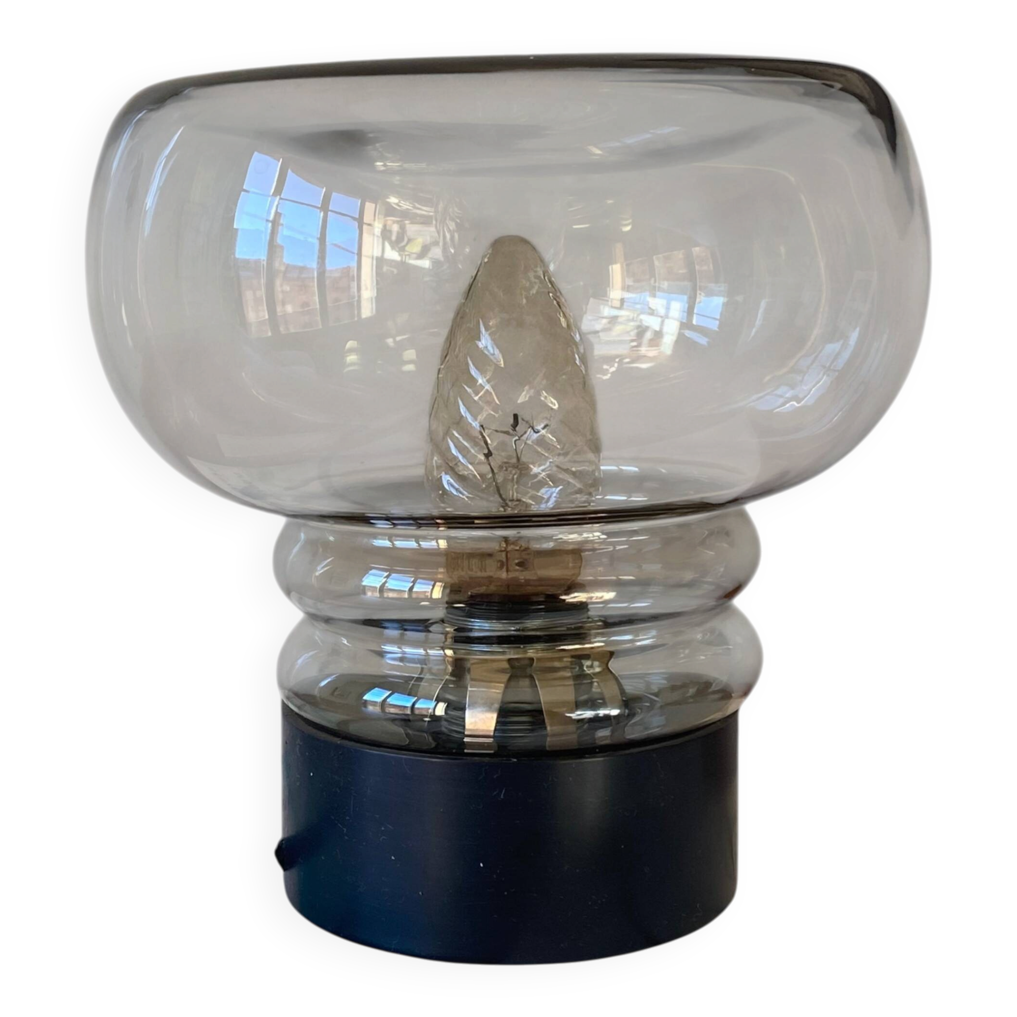 Sciolari table lamp with smoked glass globe and black plastic base.