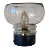 Sciolari table lamp with smoked glass globe and black plastic base.