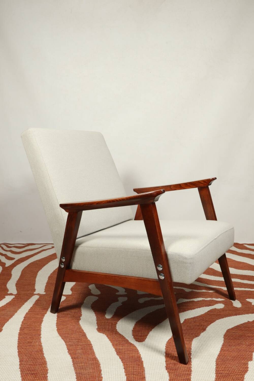 Vintage light gray armchair dark wood Scandinavian design 1970