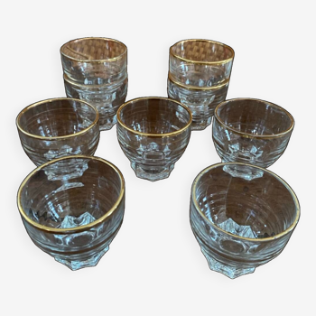 9 glasses with vintage gold edging.