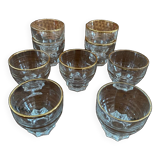 9 vintage gold rimmed glasses.