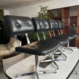Metal chairs with black faux leather from the 1980s.