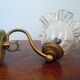 Wall lamps in gilded metal, verrine in the shape of amber glass corollas, 70s